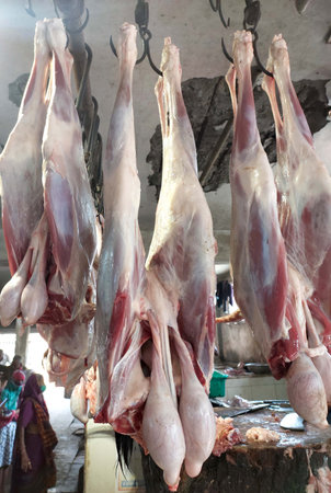 Fresh meat hanging in India meat market