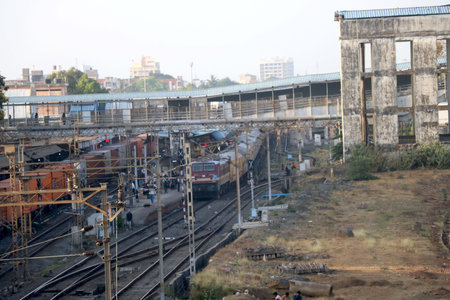 Indian goods and passenger train has stopped at rail stationの写真素材