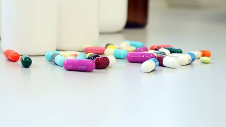 Colorful tablets, pills and capsules medicine using for treatment and cure the disease or sickness. Drug prescription using for medication in medical clinic, pharmacy Pharmaceutical service concept.の写真素材