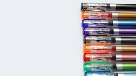 Close up colorful pens rainbow isolated in white background has copy space for text, using for studying in school class room, back to school template learning concept,  template.の写真素材