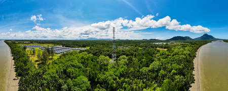 4g and 5g cellular telecommunication towers with panoramic landscape scenery