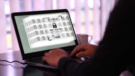 User typing login and password on virtual screen. Cyber security concept.の写真素材