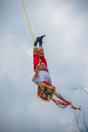 Otomi people perform the traditional Dance of the Flyers. An ancient ritual dating back 1,500 years. Celebration is performed in the Parque de Chapultepec in Mexico city in front of Touristsのeditorial素材