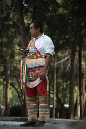 Otomi people perform the traditional Dance of the Flyers. An ancient ritual dating back 1,500 years. Celebration is performed in the Parque de Chapultepec in Mexico city in front of Touristsのeditorial素材
