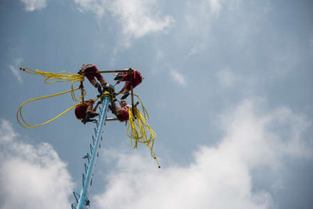 Otomi people perform the traditional Dance of the Flyers. An ancient ritual dating back 1,500 years. Celebration is performed in the Parque de Chapultepec in Mexico city in front of Touristsのeditorial素材