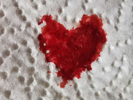Blood heart on a napkinの写真素材