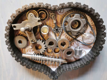 Mechanical heart from gears and chainの写真素材