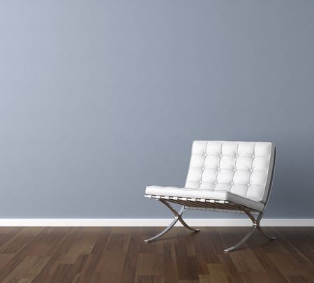 Interior design scene with a modern white chair and lamp on blue wall, copy space in the wallの写真素材