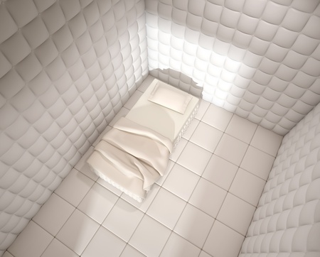 mental hospital padded room seen from above with a single bedの写真素材