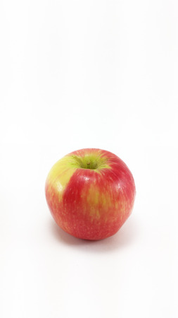 an isolated apple in white backgroundの写真素材