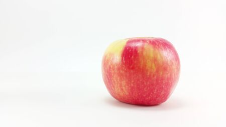 isolated red apple in white backgroundの写真素材