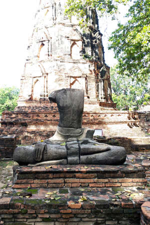 An ancient damaged buddha statue at Ayutthaya, Thailandの写真素材