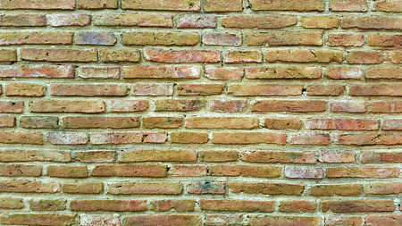 Vintage brown brick wall backgroundの写真素材