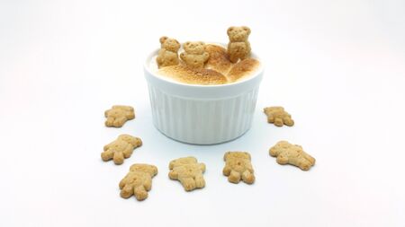 S'More dip with bear shape cookies on white backgroundの写真素材