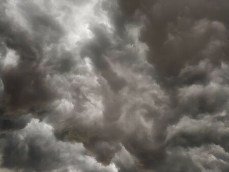 Dark and powerful stormy clouds skyの写真素材