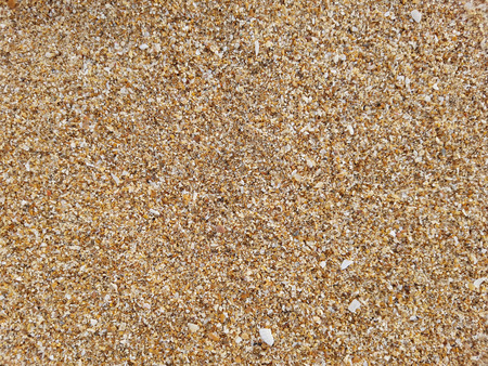 Texture of closed up rough sand on the beach from top viewの写真素材