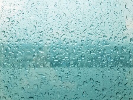 window in raining day. vision is not clear with fog of rain.の写真素材