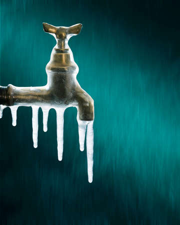 Still life photography of icicles on the water tapの写真素材