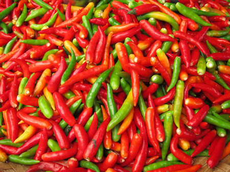 Fresh Red, Green And Yellow Chili Peppers