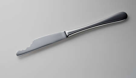 Hunger. Eaten knife on a white background.の写真素材