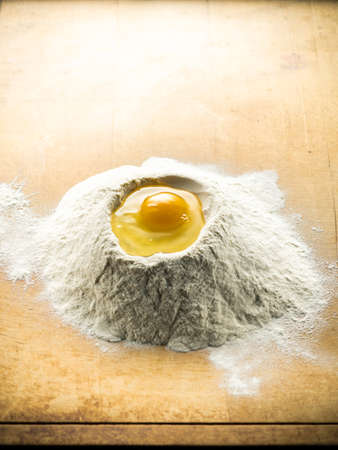 Homemade pasta. Flour and egg preparation of the dough.の写真素材