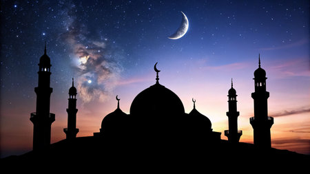 Ramadan Kareem background. Silhouette of mosque and moon