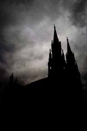 Dark gloomy clouds above the catedral of ST Gerhardの写真素材