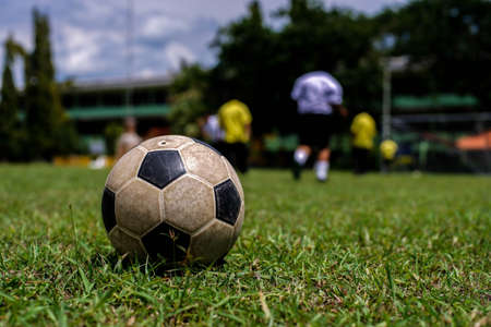 Thai student playing footballの写真素材