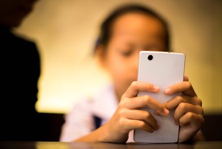 Child playing smartphone