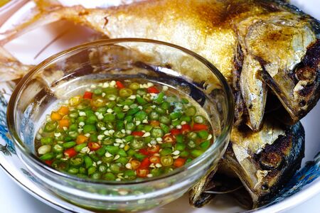Fried mackarel with Chilli and fish sauce.の写真素材