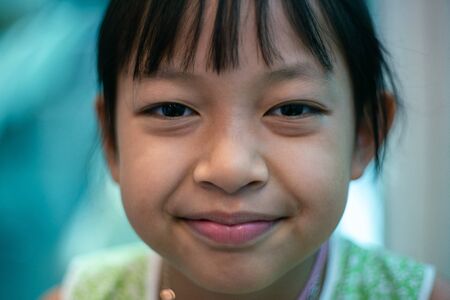 Portrait of happy smiling child girlの写真素材