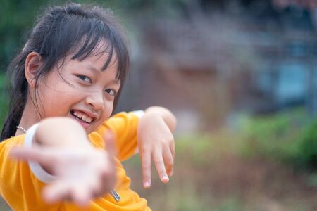 Portrait of happy smiling child girl with dancingの写真素材