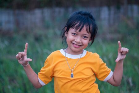 Portrait of happy smiling child girlの写真素材