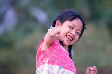 Portrait of happy smiling asian child girlの写真素材