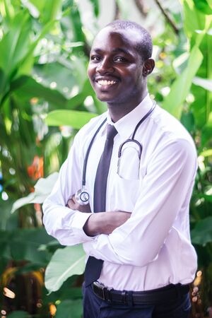 Portrait of african smiling doctorの写真素材