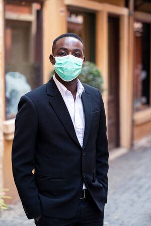 African businessman with medical mask for protect from corona virus or covid-19の写真素材