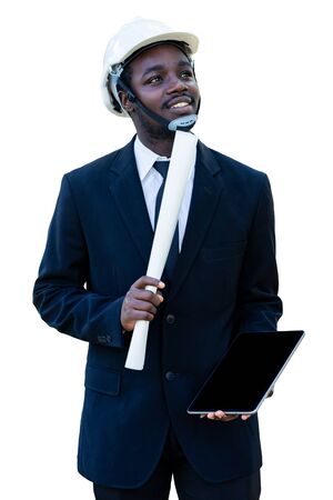 African industrial engineer manager thinking and holding tablet with isoleted white background.の写真素材