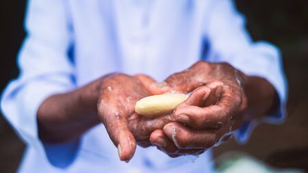 Close up to old woman washing his hands with soap.16:9 style
