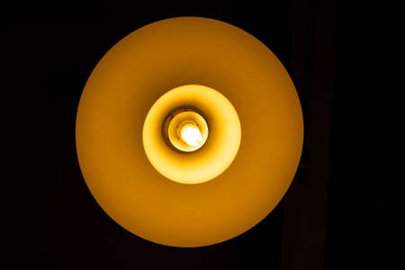 LED Fluorescent light on dark ceilingの写真素材