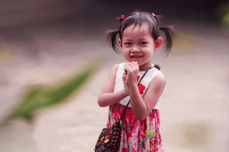 Portrait of happy smiling little child girlの写真素材