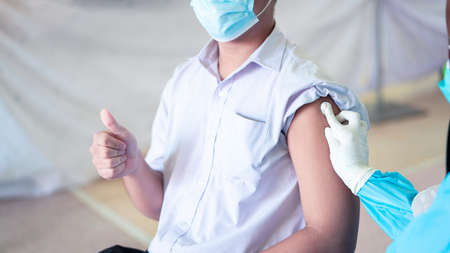 Students are vaccinated against the virusの写真素材