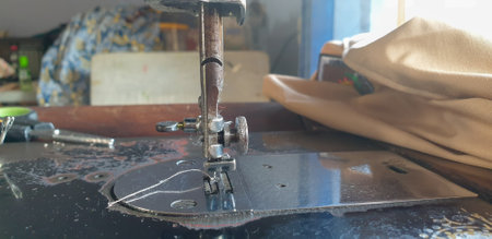 close up of sewing machine needle