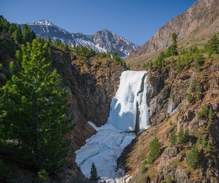 Ice waterfall in the mountains Tunkinsky loaches of the Eastern Sayan mountainsの写真素材