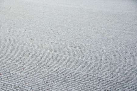 Background pattern of gravel in a japanese zen stone gardenの写真素材