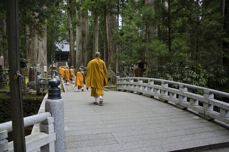Buddhist monks walking to a temple in Koya-san, Japanのeditorial素材