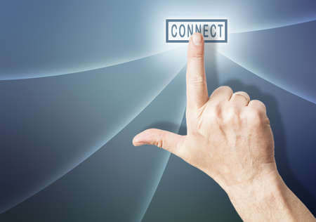 a finger presing a connect button, blue backgroundの写真素材