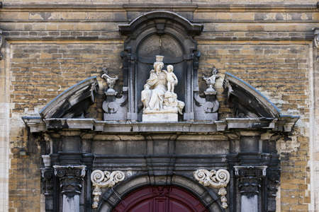 Gent, Belgium - April 1, 2020: Sculptural detail on front of the church in the small beguinage Ter Hoye. Unesco Listed.のeditorial素材