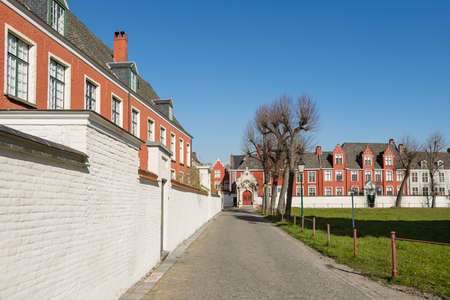 Gent, Belgium - April 1, 2020: Houses in the small beguinage Ter Hoyen. Unesco Listed.のeditorial素材