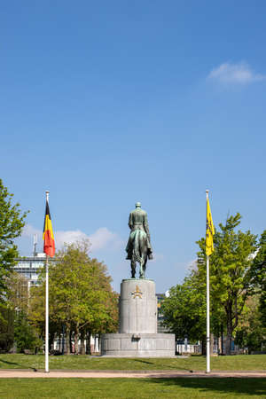 Ghent, Belgium - April 26, 2020: Statue of King Albert 1, photographed from behind in the King Albert Park or Zuidpark.のeditorial素材