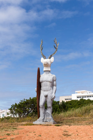 Nazare, Portugal - June 27, 2021: The famous statue of the deer surfer the surfista da Nazare.のeditorial素材